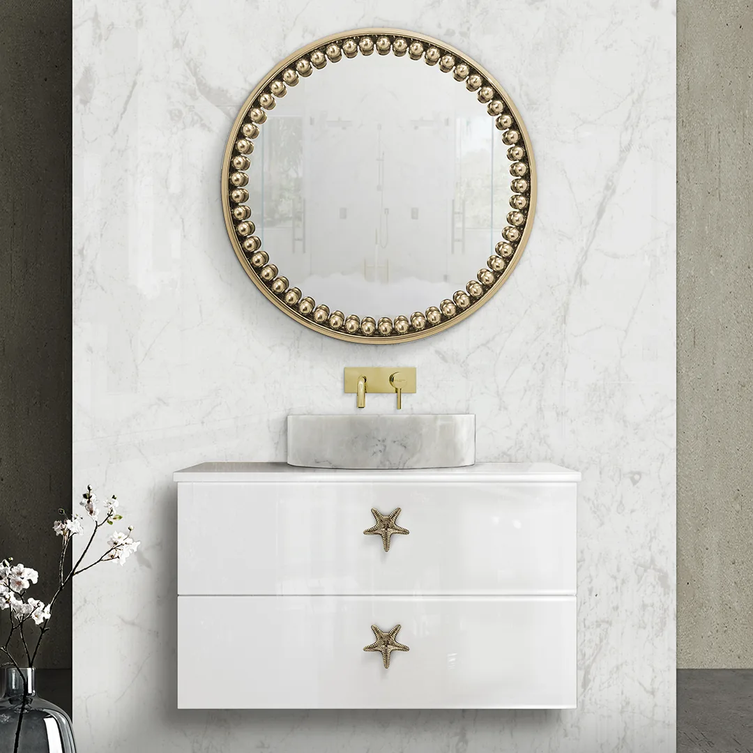 Star-shaped cabinet knobs on a white bath vanity